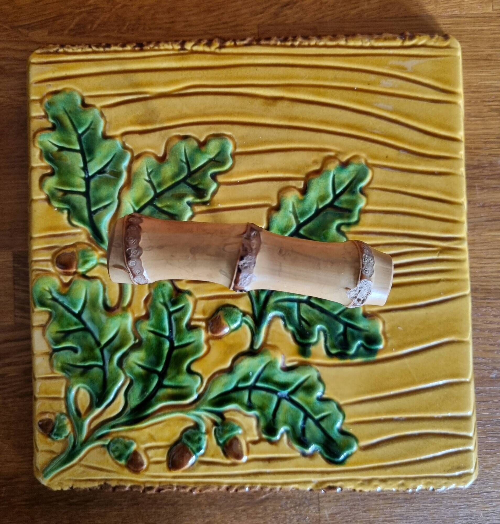 Vintage cheese platter Vallauris with wood and oak leaf pattern.