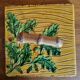 Vintage cheese platter Vallauris with wood and oak leaf pattern.