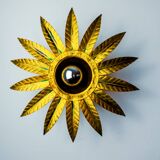 Brutalist sun wall lamp in gilded metal with gold leaf, Italy, 1970