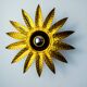Brutalist sun wall lamp in gilded metal with gold leaf, Italy, 1970