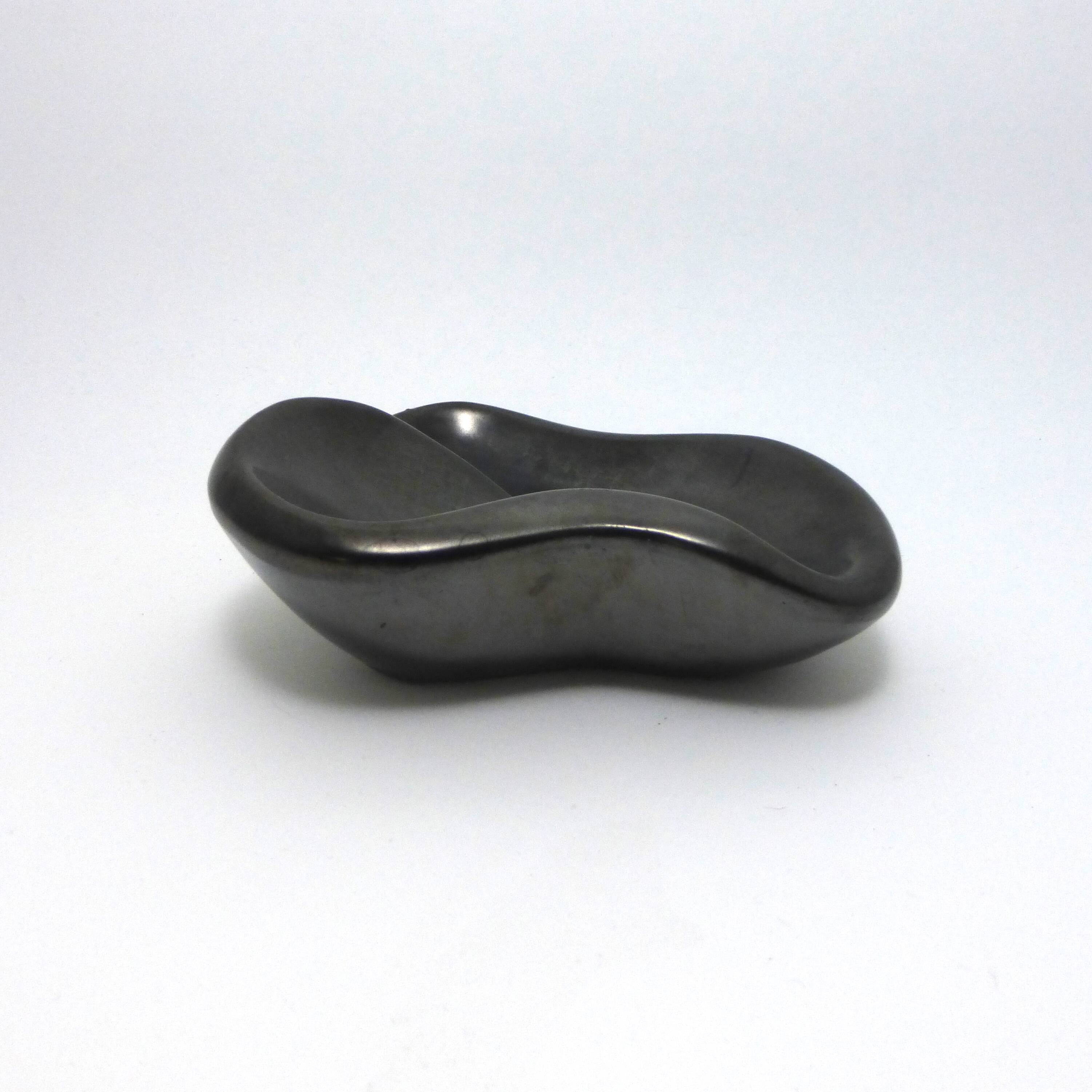 Ashtray in metallic black ceramic around 1950
