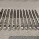 12 silver-plated dessert knives by Platil, rocaille style