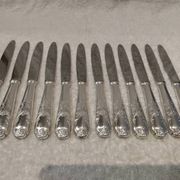 12 silver-plated dessert knives by Platil, rocaille style