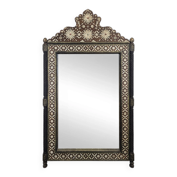 Orientalist mirror with bone inlays and hard stone cabochons.
