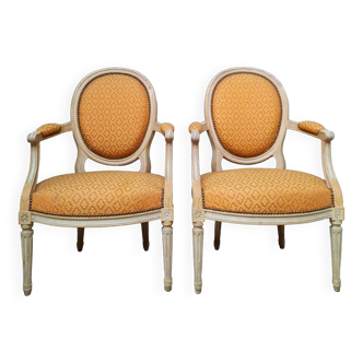 Paire de fauteuils medaillon  style Louis XVI