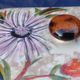 Large glazed ceramic butter cellar Vallauris signed Tess years 60/70 flower decoration in relief.