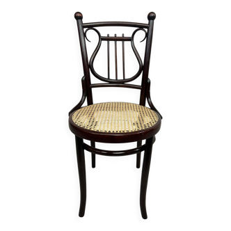 Curved wooden chair attributed to Thonet.