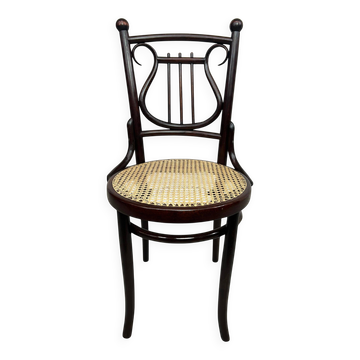 Curved wooden chair attributed to Thonet.