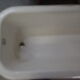 Cast iron island bathtub, on eagle-begged feet