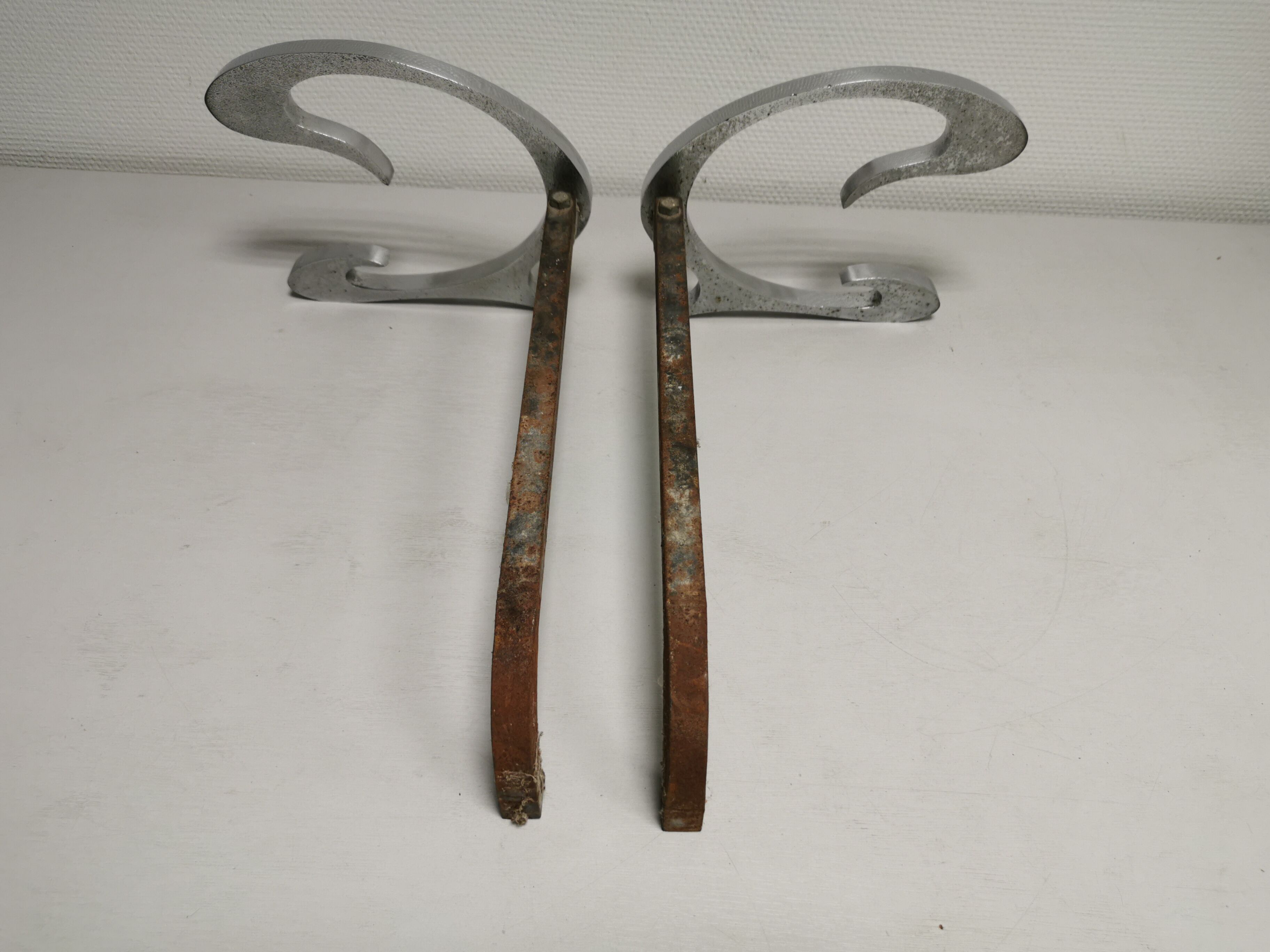 Pair of andirons in brushed steel and metal edition Jean-Paul Créations circa 1970