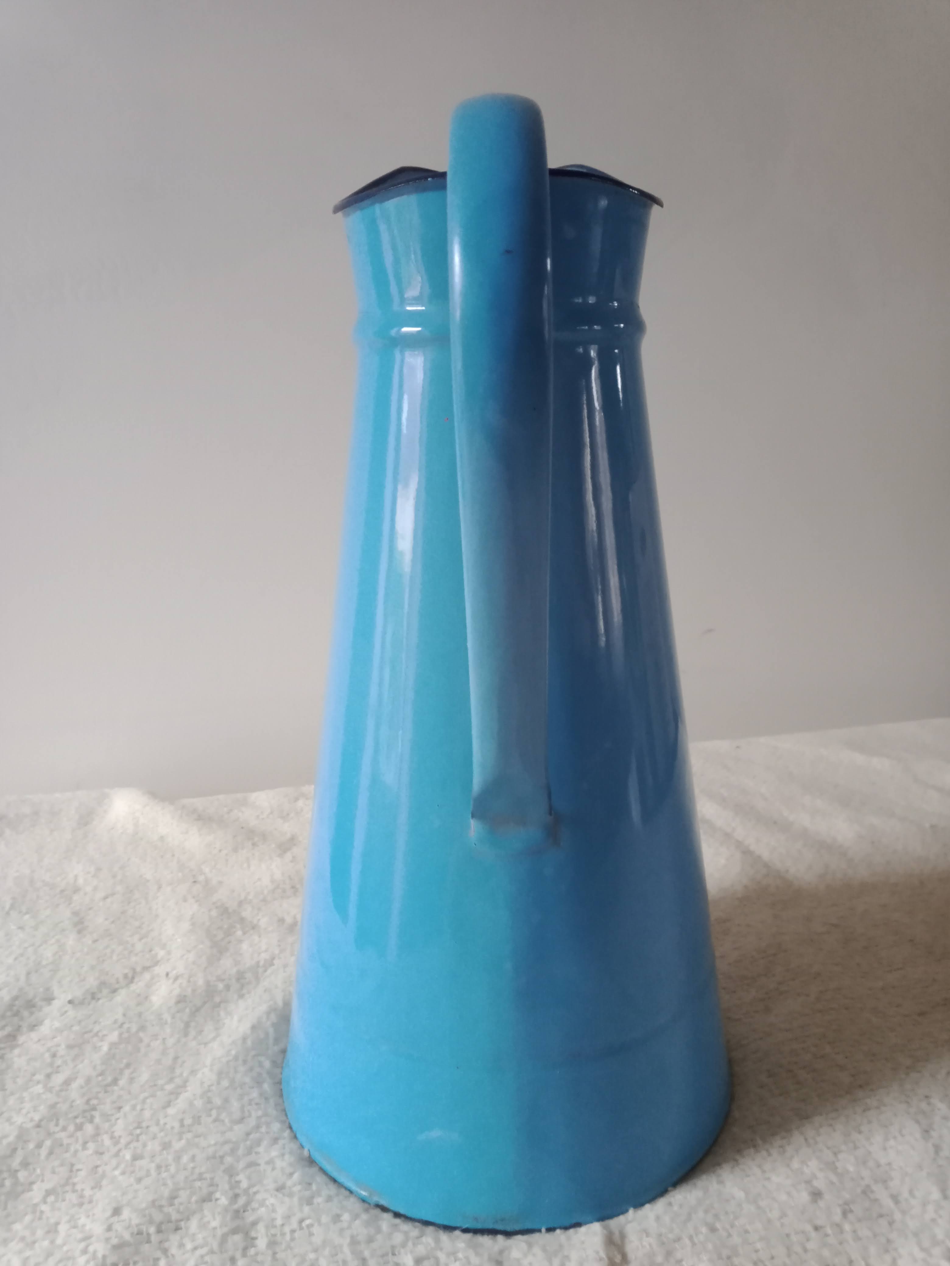 Old broc in blue enamelled sheet metal