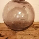 Old glass ball of fishing net marked "LT"