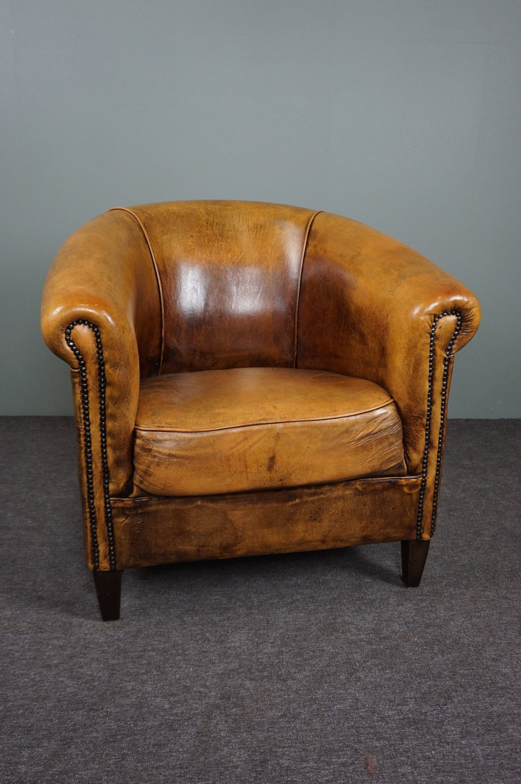 Fauteuil club en cuir de mouton