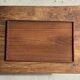 Rectangular solid teak tray with carved edges 40x25