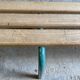 Vintage wood kindergarten bench and tubular structure in long