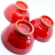 Set of 3 bright red enamelled earth bowls made in France