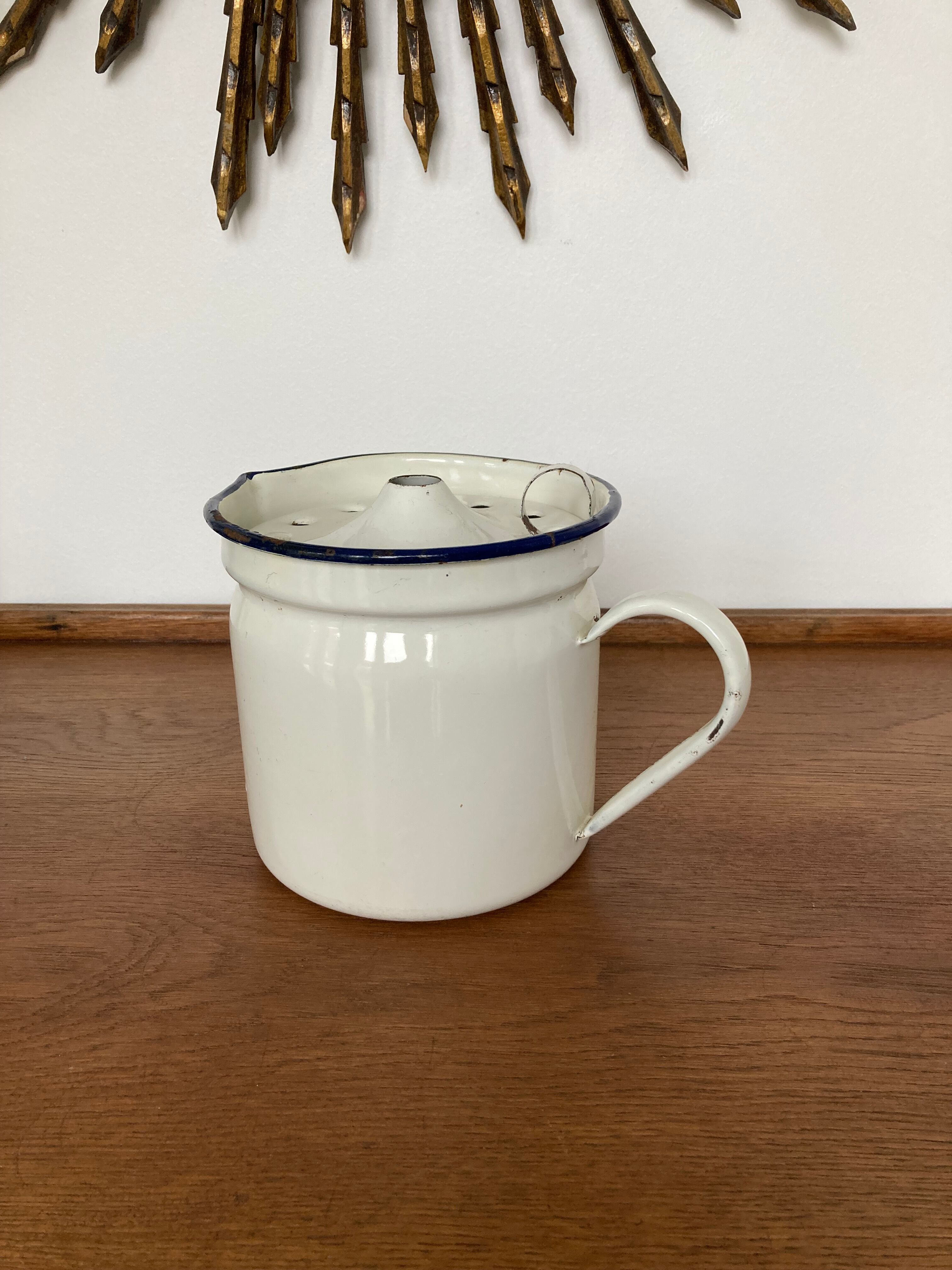 Vintage enamelled iron pitcher