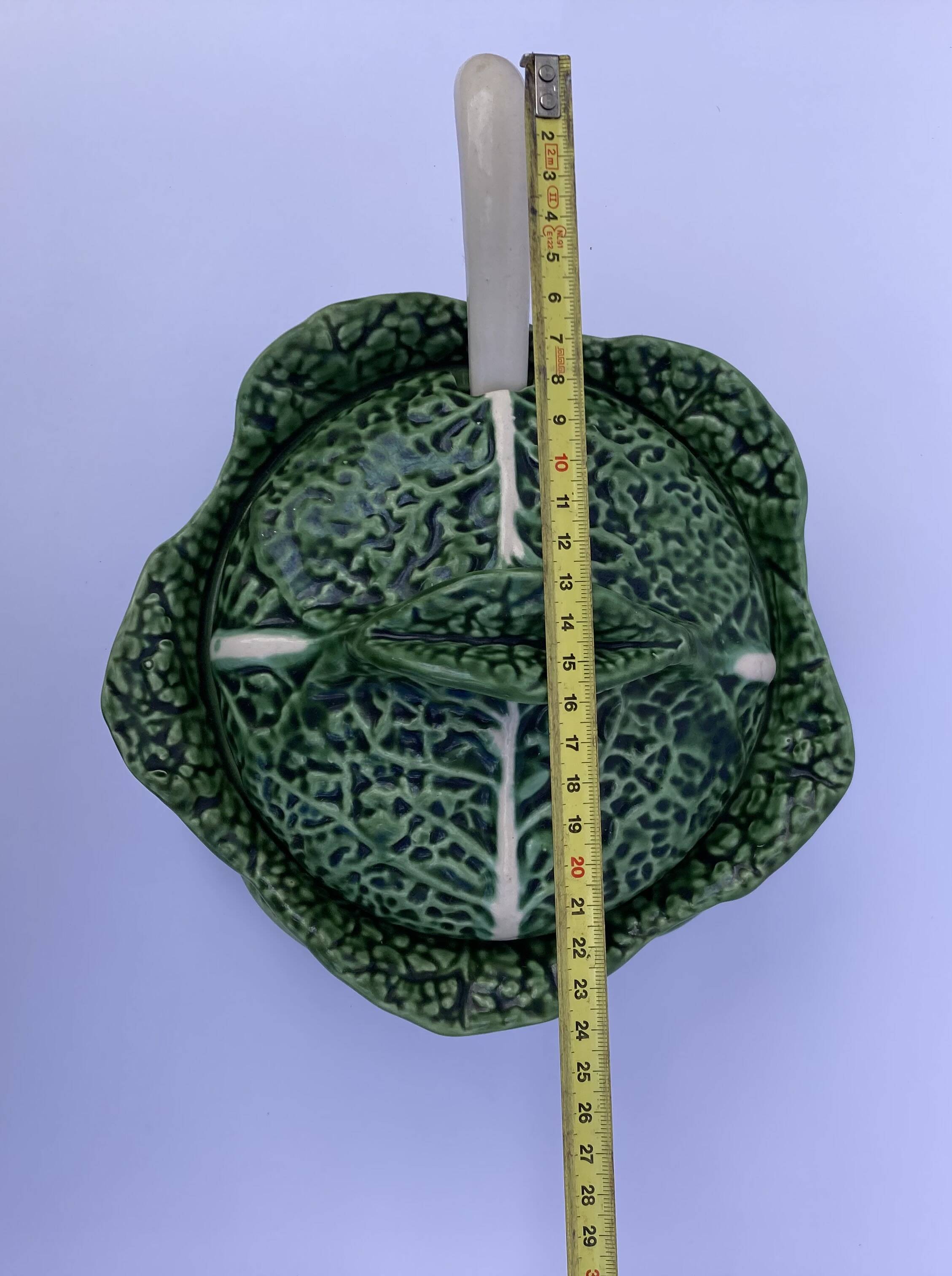 Vintage ceramic soup tureen in the shape of a cabbage.