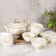 Porcelain tea service by Théodore Haviland, gilded patterns.