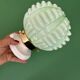 Vintage Art Deco globe wall light in pale green opaline.
