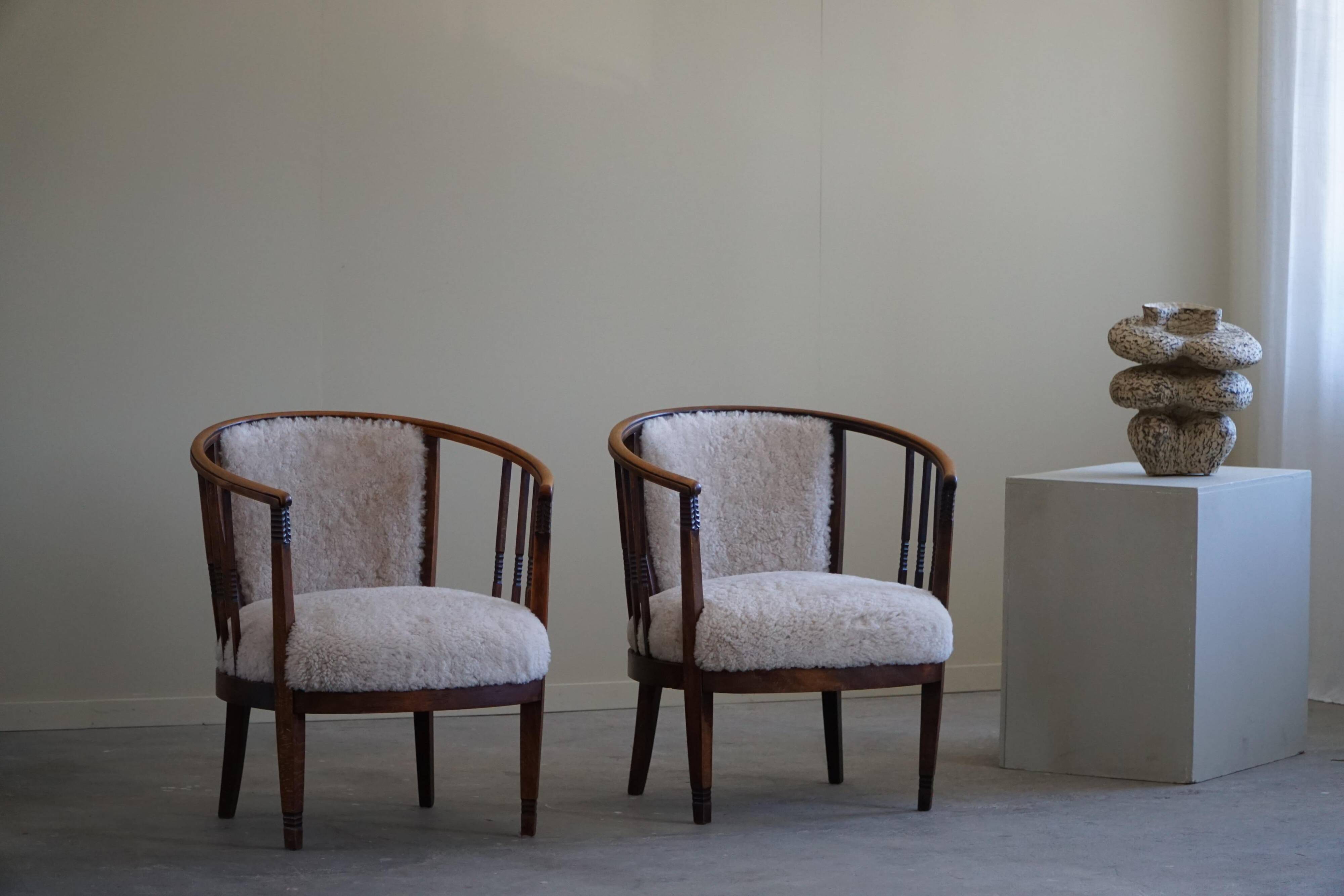 Pair of Danish armchairs in beech, reupholstered in lambswool, Art Nouveau, 1900s.
