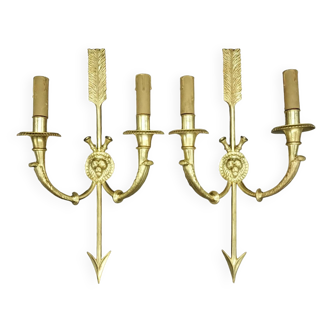 Pair of sconces, arrow and lion's head in bronze, Empire style late 19th century