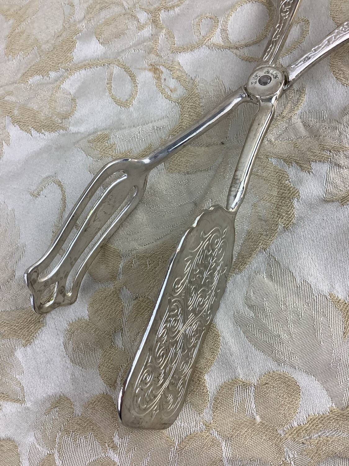 Old cutlery tongs