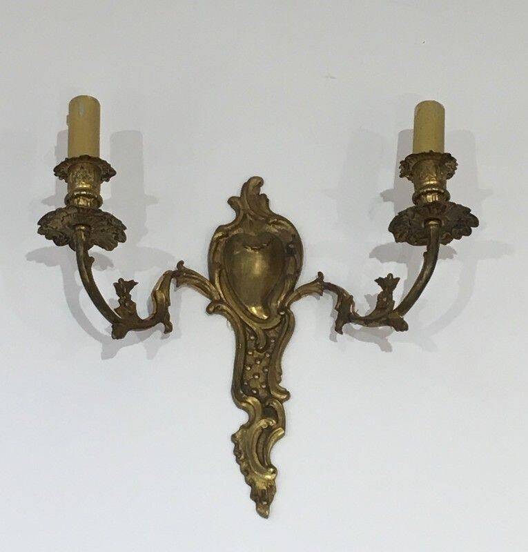Pair of Louis XV style bronze wall sconces