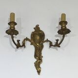 Pair of Louis XV style bronze wall sconces
