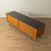 Striking mid-century sideboard with stainless steel base