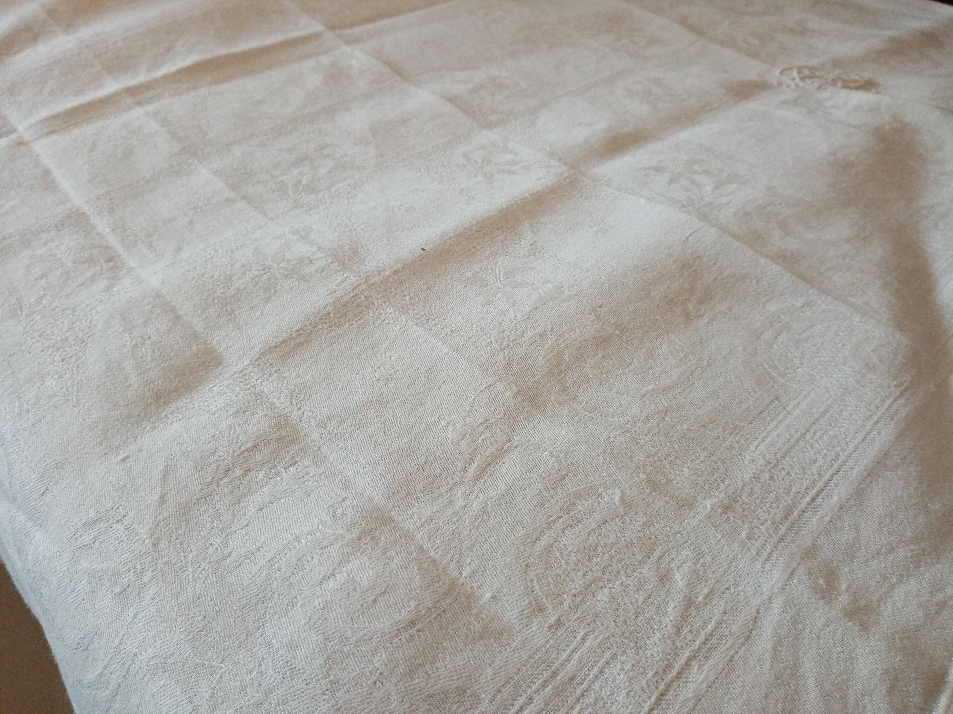 Tablecloth and its 12 damasee towels floral decorations rockery embroidered monogram