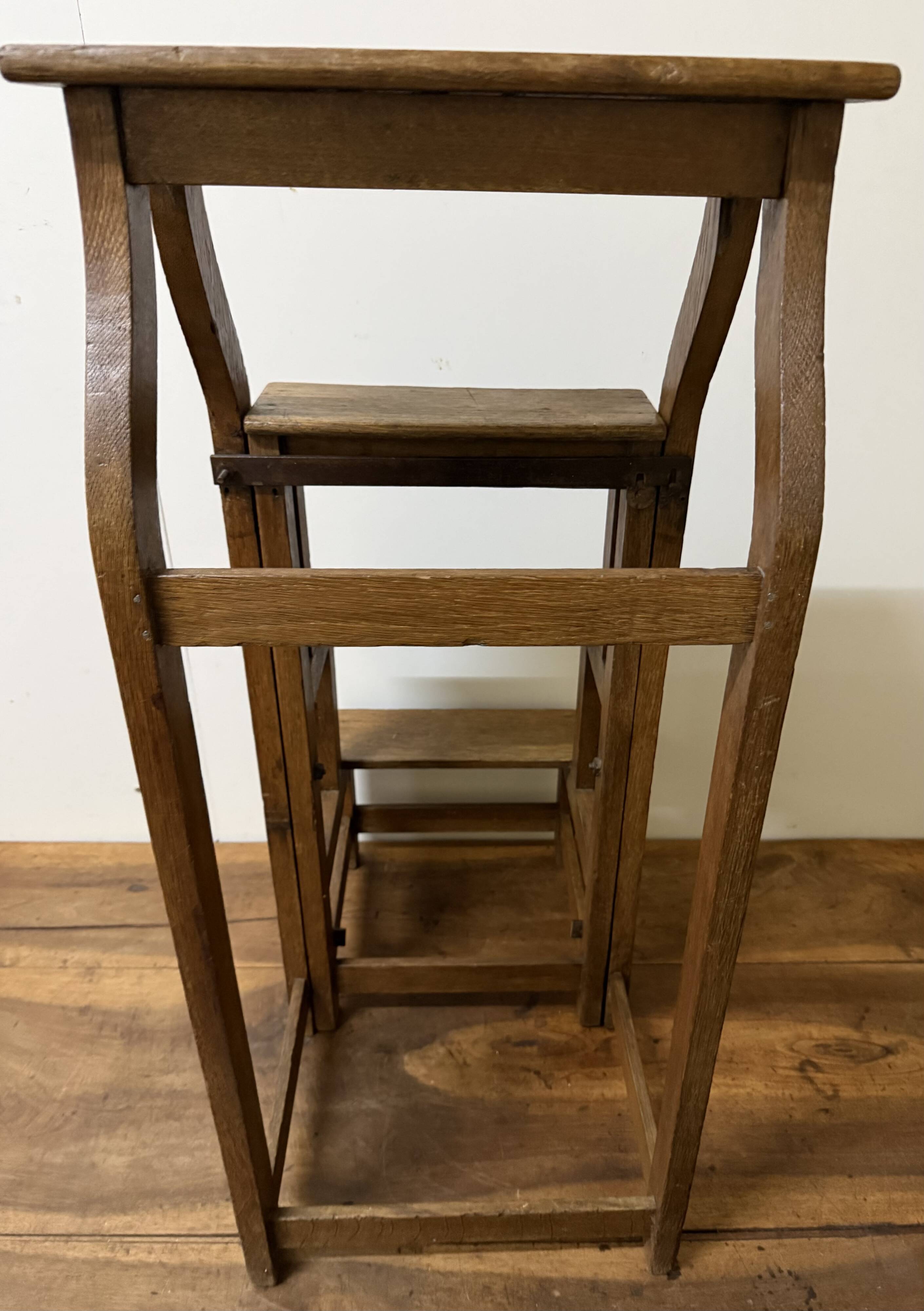 Stool transforming into a step ladder.