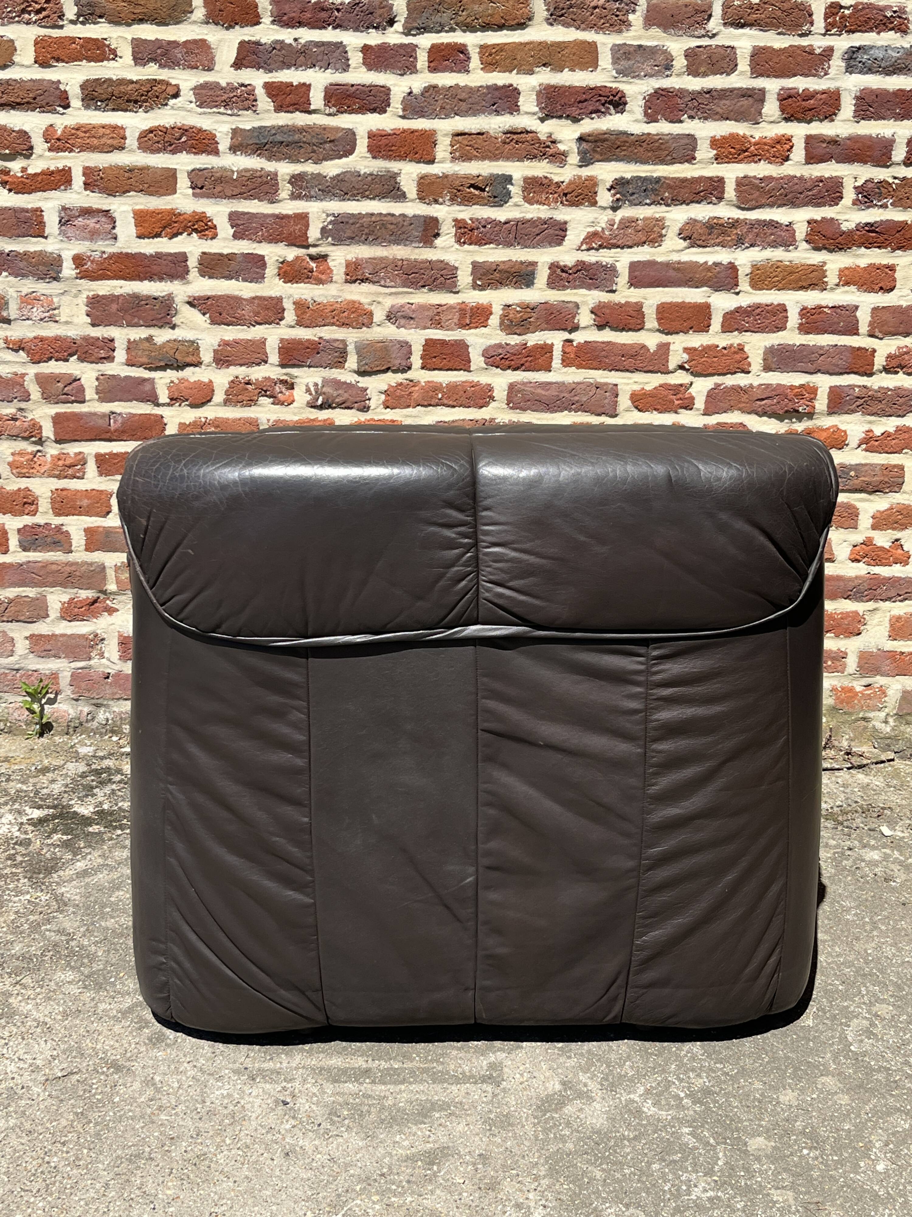 Pair of patinated leather club armchairs