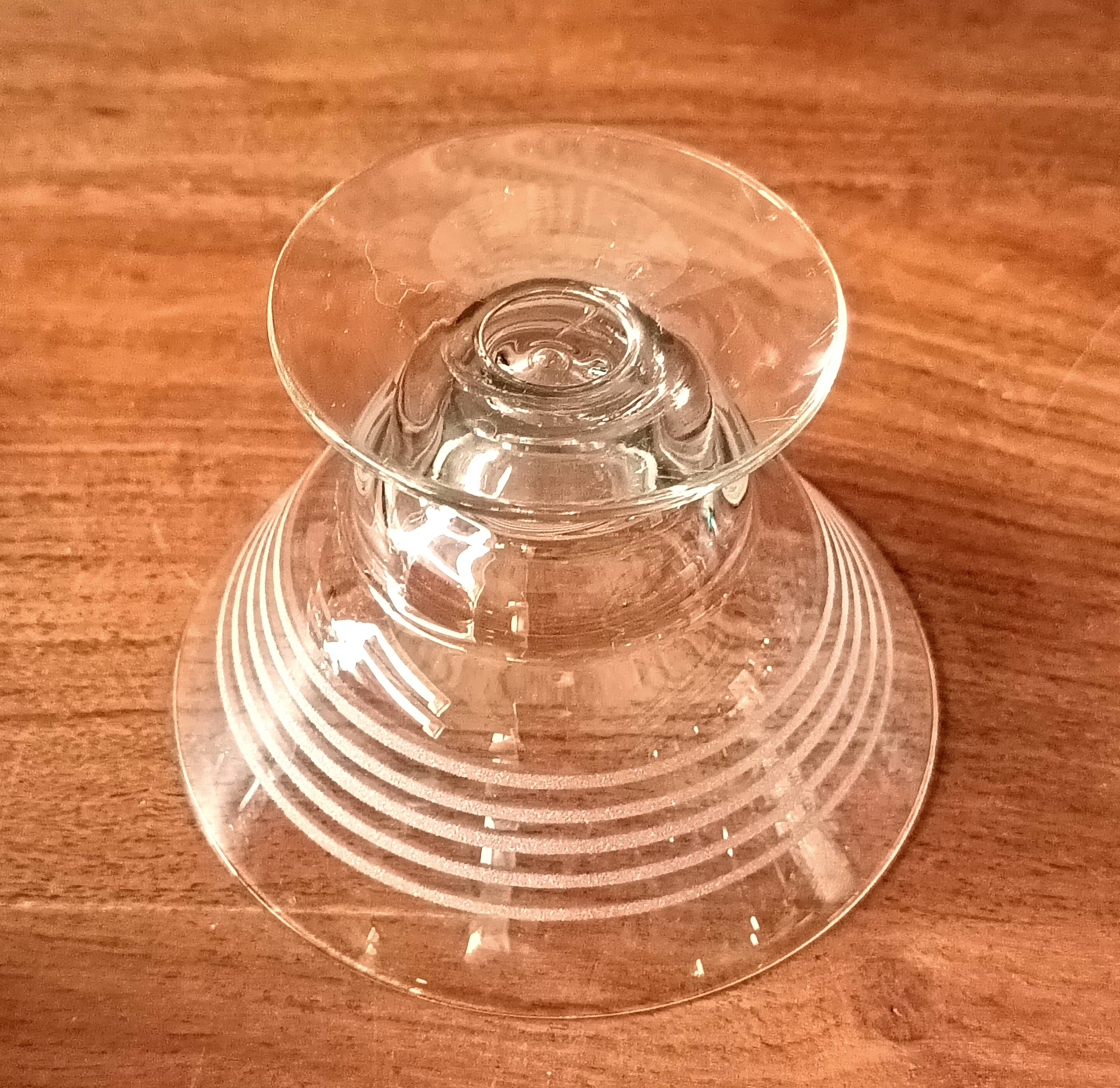 8 conical glasses with a vintage 1950s line pattern.