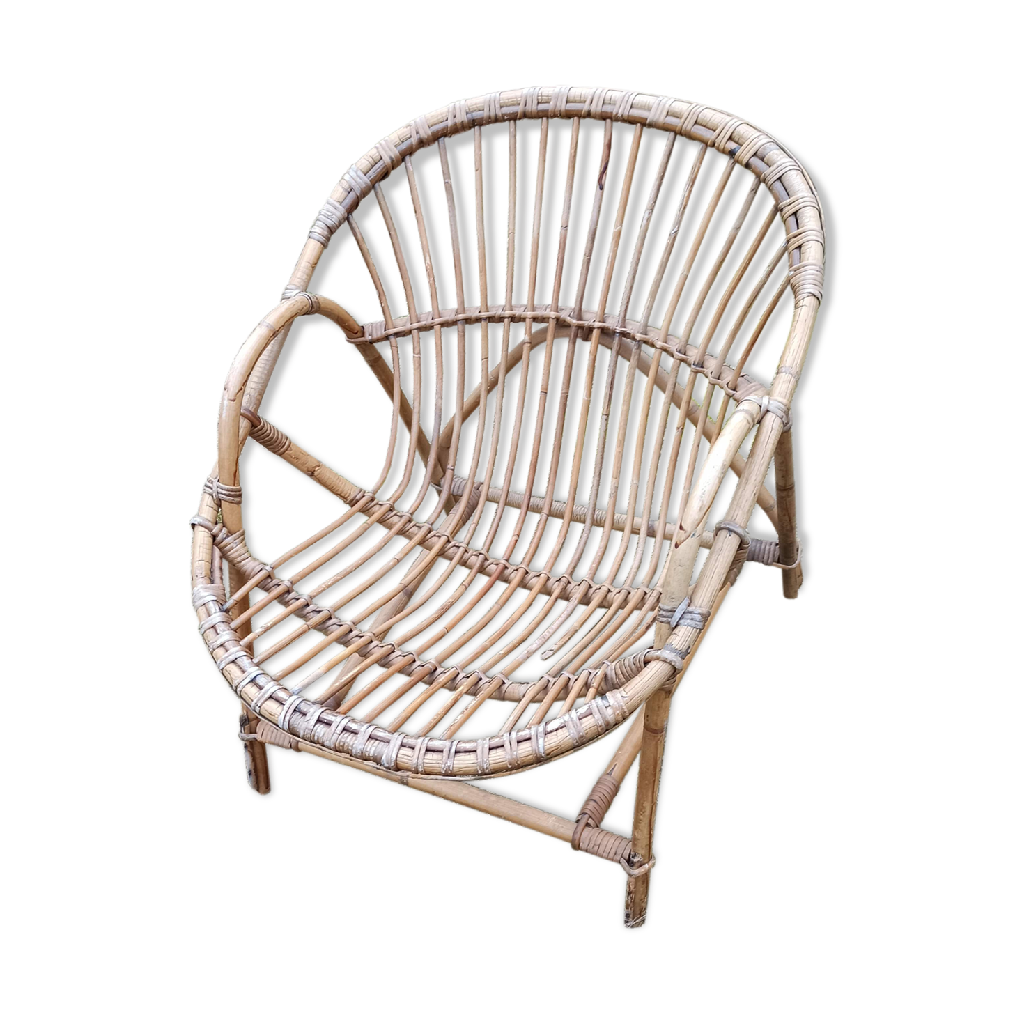 Rattan armchair with armrest
