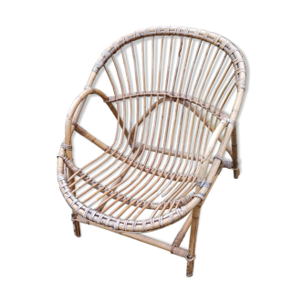 Rattan armchair with armrest