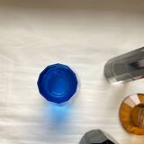 4 designer candle holders in colored glass