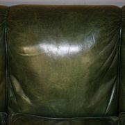 Victorian leather canapé, shield armrests, stamped Maple & Co.
