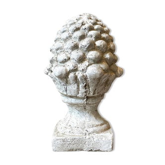 Ornamental pine cone in bleached concrete