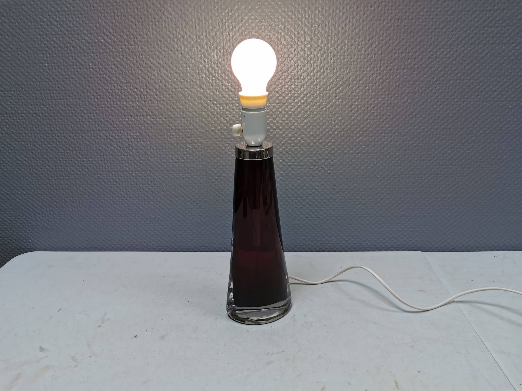 Table lamp by Carl Fagerlund for Orrefors Glassworks Sweden 1960s in translucent and deep red glass.