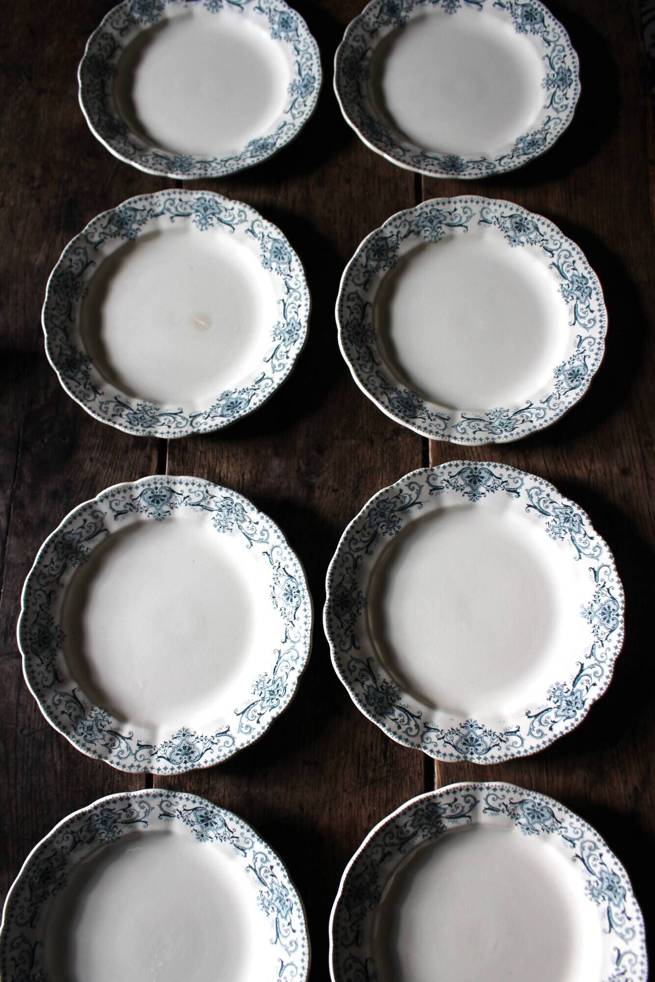 A set of 8 flat plates Terre de Fer Bleu Verdun HBC.