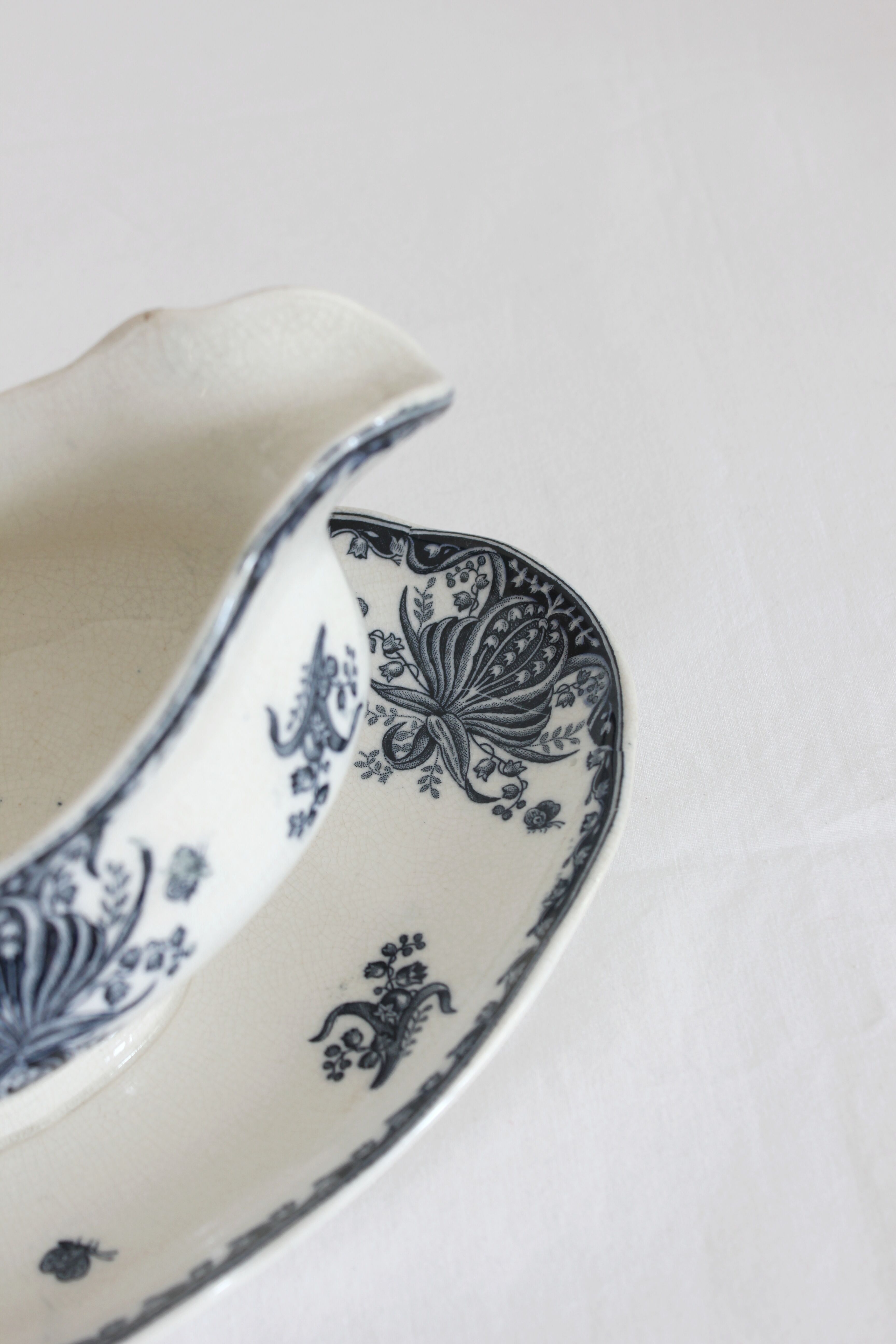 Ironware sauce boat with blue palmette decoration