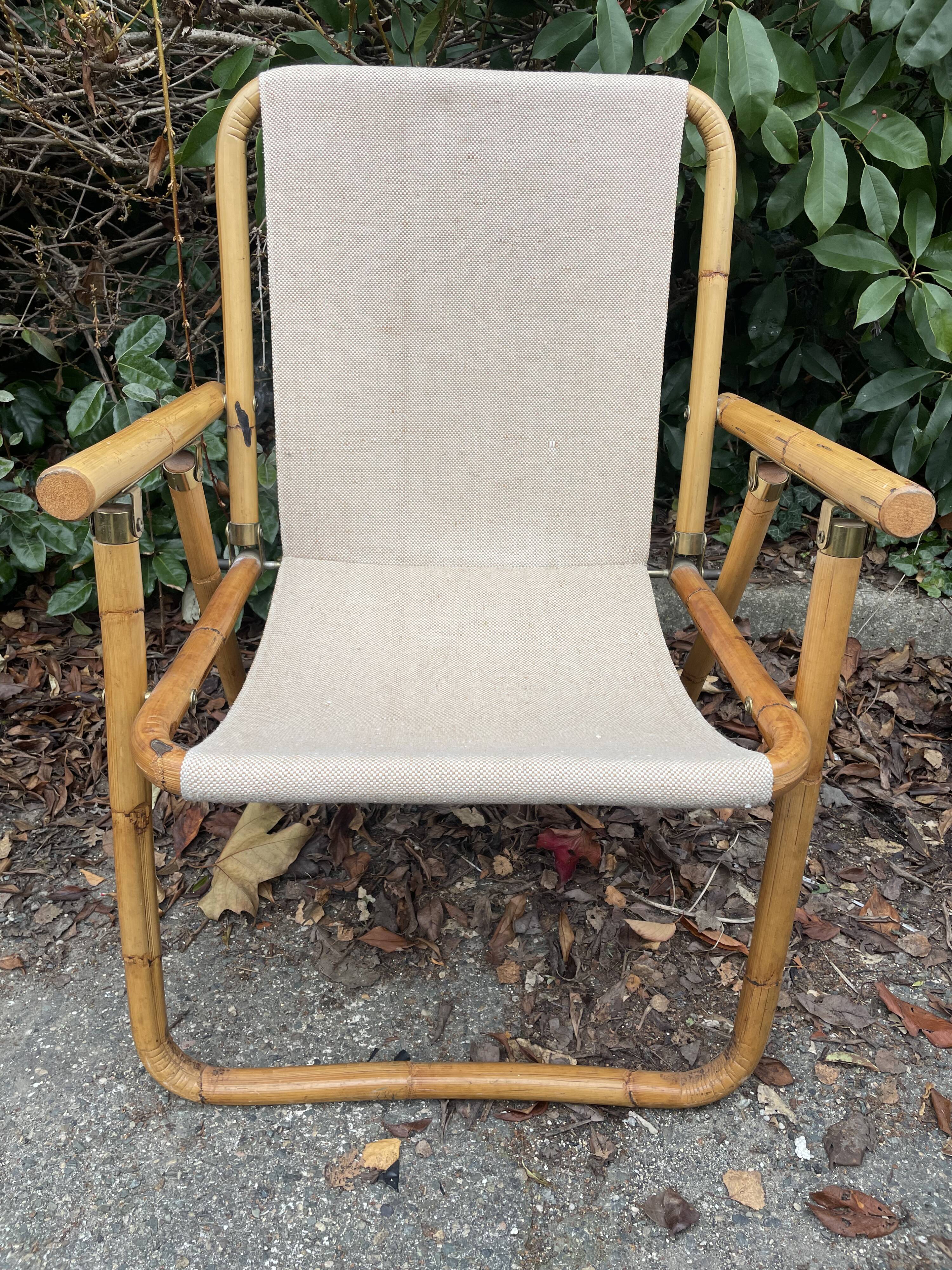 Rattan armchair and foldable canvas