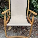 Rattan armchair and foldable canvas