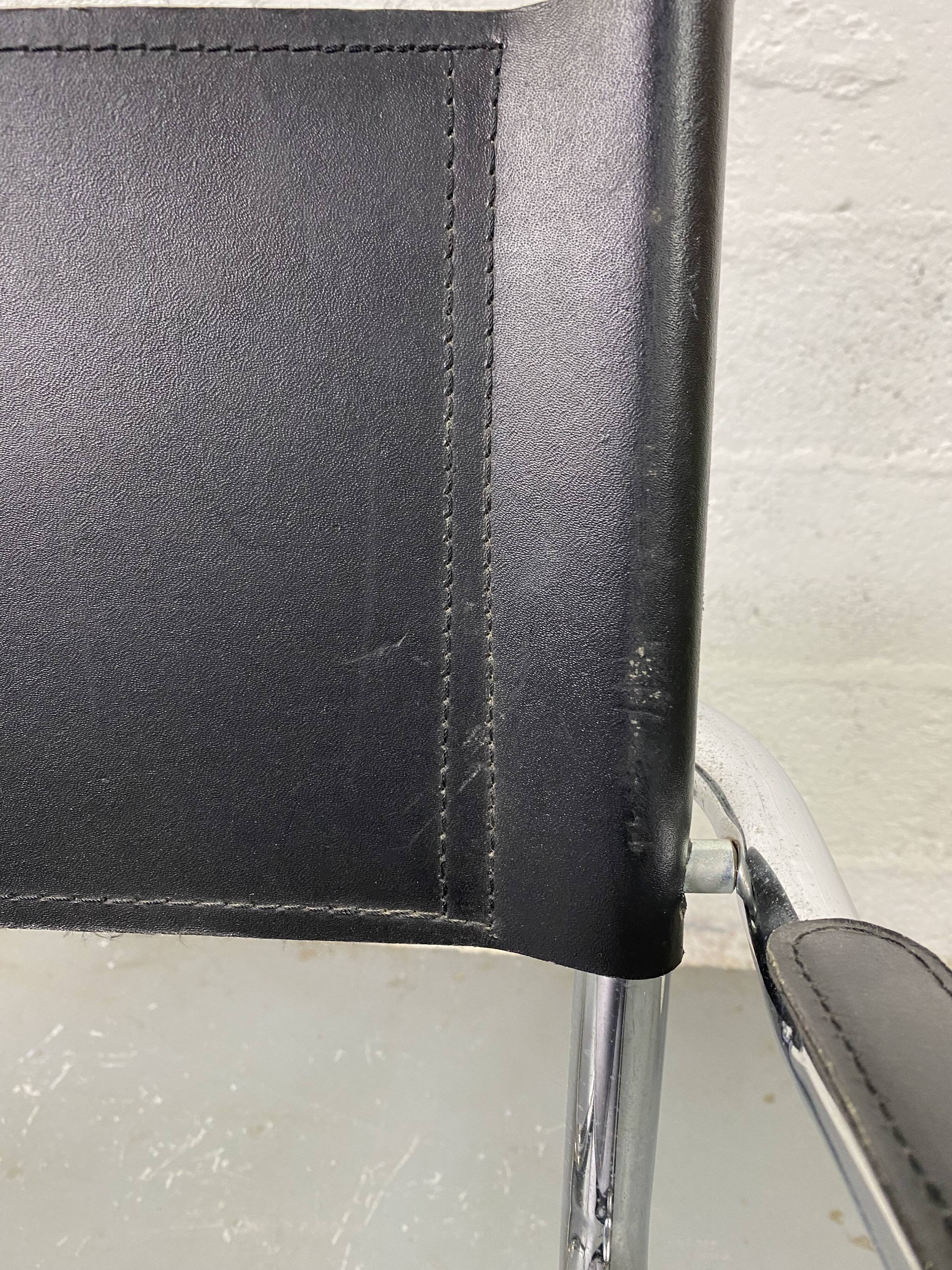 Pair of design armchairs in imitation leather chrome
