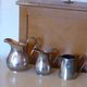 Coffee set in silver metal composed of 3 pitchers, Millan Freres, Paris