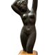 Ceramic statue with a wooden base after Giraud.