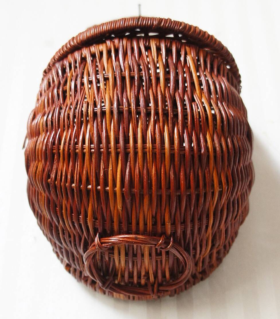 Woven rattan wall basket