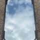 Vintage rectangular wall mirror in tubular metal and brass, 1970s/1980s.
