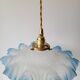 Suspension in opaline